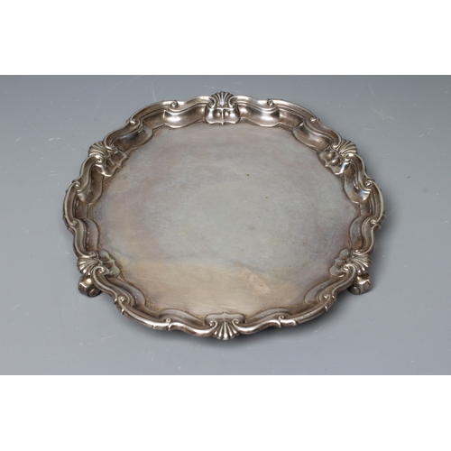 145 - A LATE VICTORIAN SILVER SALVER by James Dixon & Sons, Sheffield 1899, of shaped circular form, the p... 