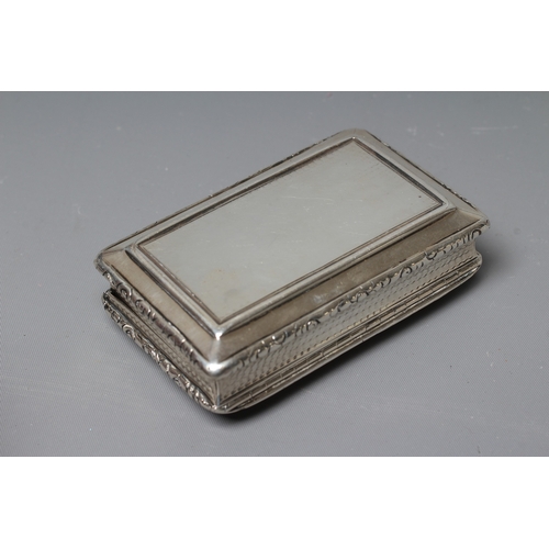 147 - A WILLIAM IV SILVER TABLE SNUFF BOX by Nathaniel Mills, Birmingham 1834, of rounded oblong form with... 