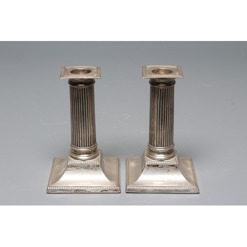 160 - A PAIR OF LATE VICTORIAN SILVER SMALL CANDLESTICKS by Lee & Wigfull, Sheffield 1902, with bead stamp... 