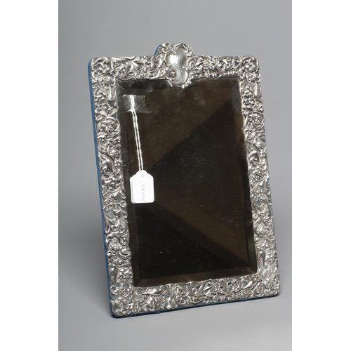 170 - A LATE VICTORIAN SILVER EASEL BACK MIRROR by William Comyns, London 1895, of vertical oblong form, t... 