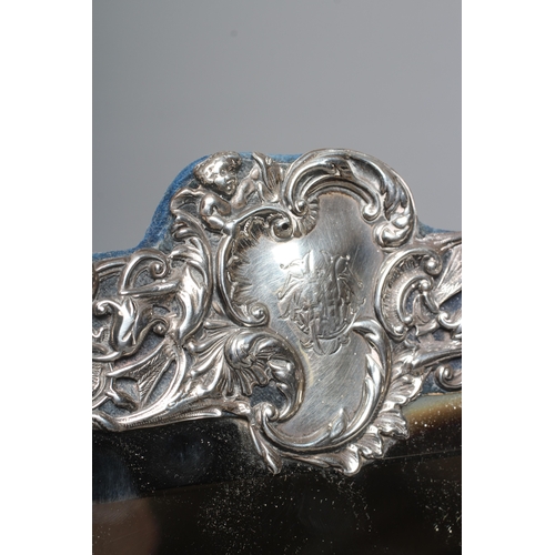 170 - A LATE VICTORIAN SILVER EASEL BACK MIRROR by William Comyns, London 1895, of vertical oblong form, t... 