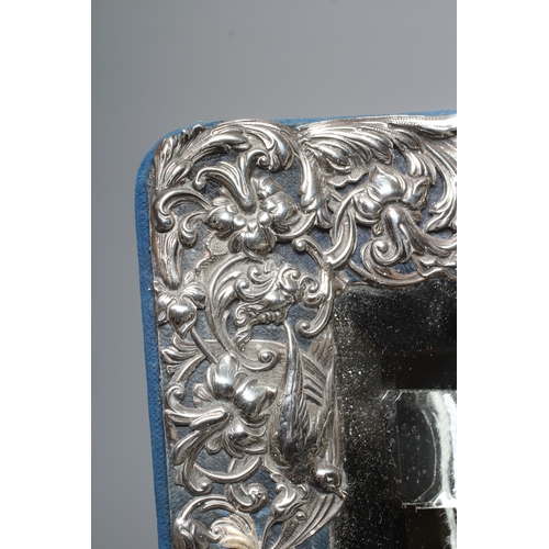 170 - A LATE VICTORIAN SILVER EASEL BACK MIRROR by William Comyns, London 1895, of vertical oblong form, t... 