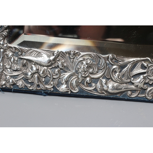 170 - A LATE VICTORIAN SILVER EASEL BACK MIRROR by William Comyns, London 1895, of vertical oblong form, t... 