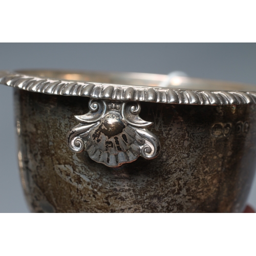 174 - A GEORGE IV SILVER WINE FUNNEL, maker's mark possibly WE, London 1829, with everted gadrooned rim an... 