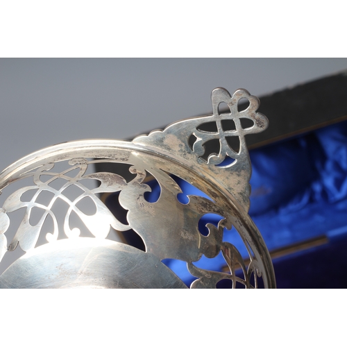180 - AN EDWARD VII SILVER CIRCULAR BOWL by Martin, Hall & Co., Sheffield 1910, with two lug handles, with... 