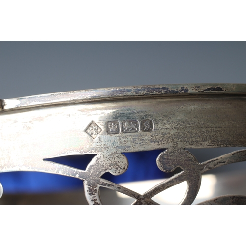 180 - AN EDWARD VII SILVER CIRCULAR BOWL by Martin, Hall & Co., Sheffield 1910, with two lug handles, with... 