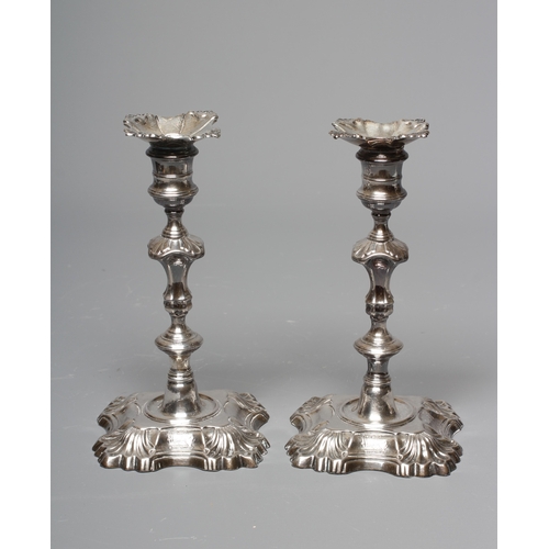 183 - A PAIR OF GEORGE II SILVER CANDLESTICKS by William Gould, London 1747, with detachable dished drip p... 