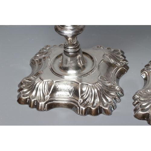 183 - A PAIR OF GEORGE II SILVER CANDLESTICKS by William Gould, London 1747, with detachable dished drip p... 