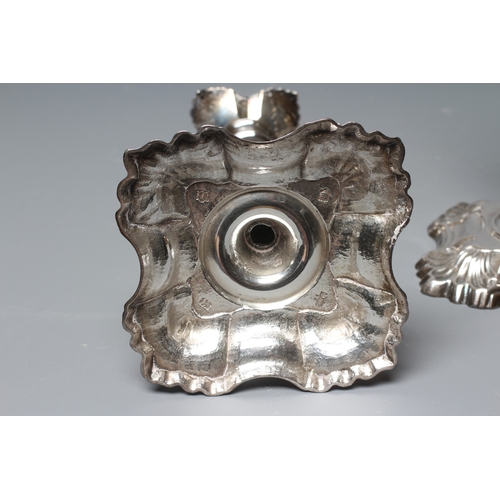 183 - A PAIR OF GEORGE II SILVER CANDLESTICKS by William Gould, London 1747, with detachable dished drip p... 
