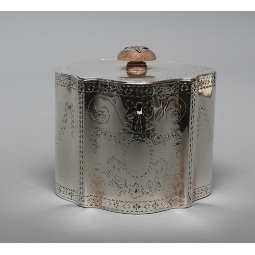 185 - A LATE GEORGE III SILVER TEA CADDY by Thomas Daniell, London 1780, of serpentine form, the flat hing... 