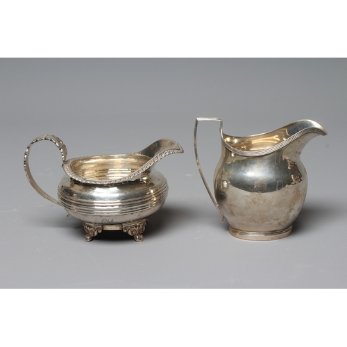 186 - A GEORGE IV SILVER MILK JUG by William M Traies, London 1825, the squat globular reeded body with ca... 