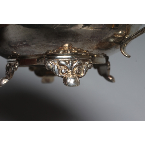 186 - A GEORGE IV SILVER MILK JUG by William M Traies, London 1825, the squat globular reeded body with ca... 