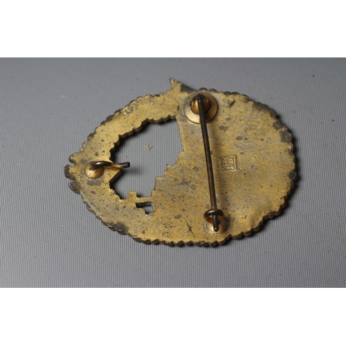394 - A GERMAN THIRD REICH DESTROYER BADGE by Joseph Felix & Sohn, with lateral pin and suspension hook