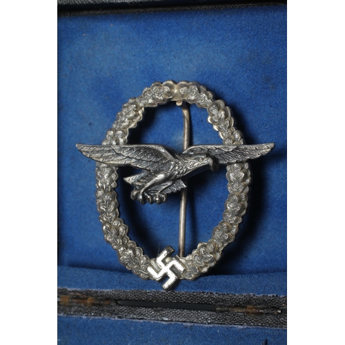 396 - TWO GERMAN THIRD REICH LUFTWAFFE BADGES, comprising a boxed Pilot Observer badge stamped GWL, and a ... 