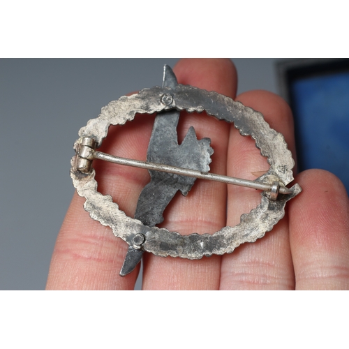 396 - TWO GERMAN THIRD REICH LUFTWAFFE BADGES, comprising a boxed Pilot Observer badge stamped GWL, and a ... 
