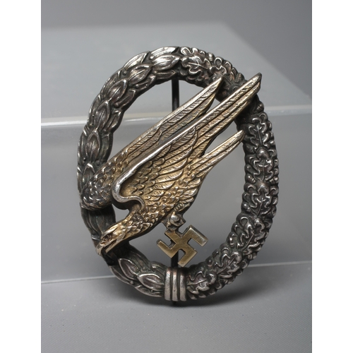 397 - A GERMAN THIRD REICH PARATROOPER BADGE by G. E. Juncker, with vertical pin