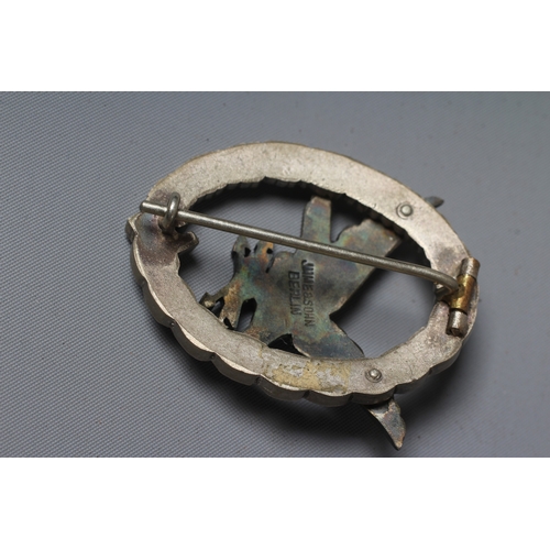 401 - A GERMAN THIRD REICH RADIO OPERATOR BADGE by JMME & SOHN, Berlin, with vertical pin