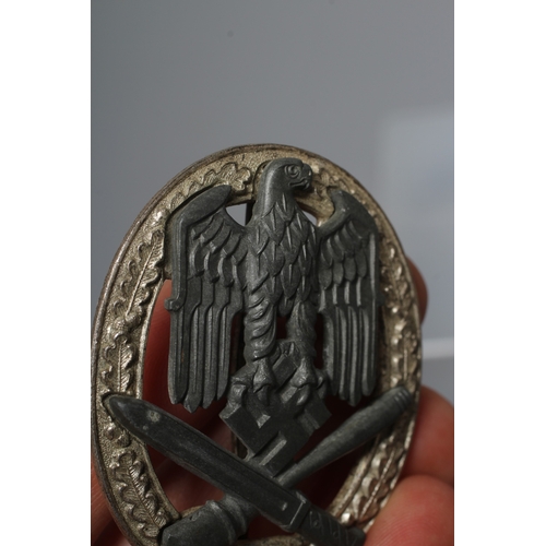 405 - A GERMAN THIRD REICH ASSAULT BADGE FOR 50 ENGAGEMENTS with JFS maker's marks, and vertical pin with ... 
