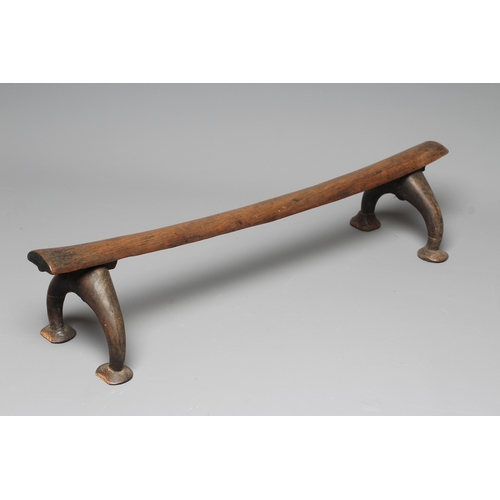 416 - AN ANTIQUE SOUTH SEA ISLAND KALI, possibly Tongan, with bowed central beam, raised on four carved le... 