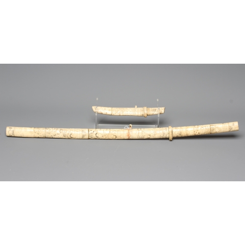 421 - TWO JAPANESE BONE MOUNTED SIDE ARMS, comprising a wakazashi with 15 1/2