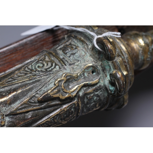 425 - A INDONESIAN BRONZE LANTAKA CANNON with flared muzzle, twin dolphin mounts, scroll rear sight, and f... 
