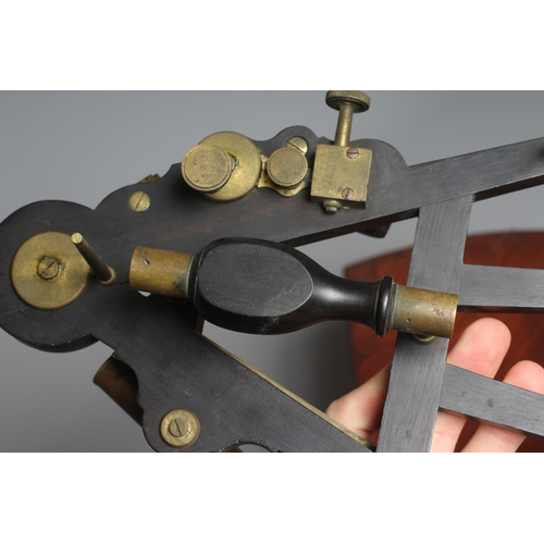 429 - A VICTORIAN SEXTANT by W. Werchert (sic), Cardiff, with ebony frame and turned grip, brass fittings ... 