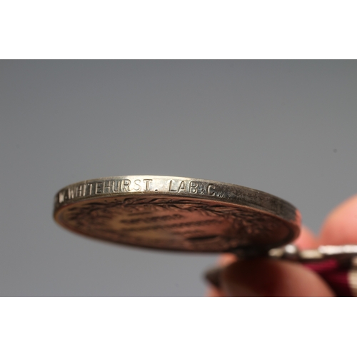 432 - A MERITORIOUS SERVICE MEDAL awarded to Pte. W. Whitehurst of the Labour Corps., on typical ribbon