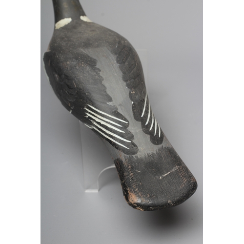 446 - A VINTAGE PINE PIGEON DECOY painted in grey and white, with cast metal beak and screw head eyes, hol... 