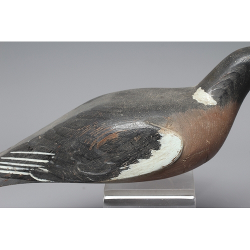 446 - A VINTAGE PINE PIGEON DECOY painted in grey and white, with cast metal beak and screw head eyes, hol... 