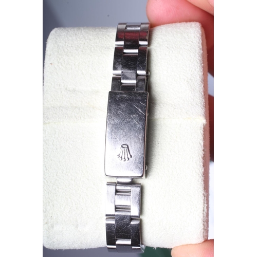 199 - A LADYS' ROLEX OYSTER PERPETUAL DATE CHRONOMETER WRISTWATCH, the black dial with applied batons, cen... 