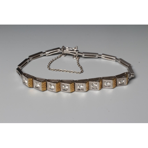 274 - AN UNUSUAL EIGHT STONE DIAMOND BRACELET, the brilliant cut stones each of approximately 0.10cts, poi... 