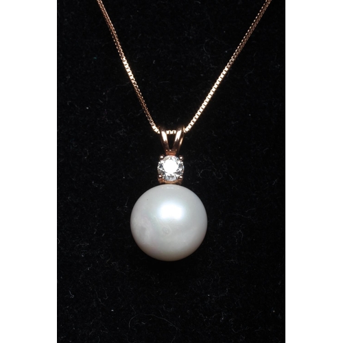 280 - A CULTURED PEARL PENDANT, the large pearl peg set to a claw set single stone diamond and open rose c... 