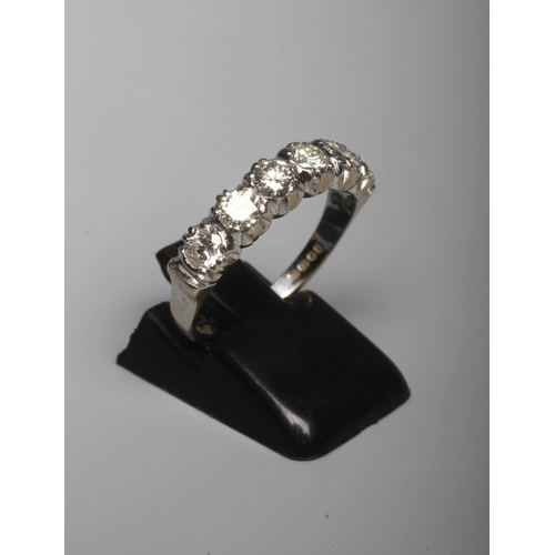 289 - A SIX STONE DIAMOND HALF HOOP RING, the brilliant cut stones point set to a plain 18ct gold shank, L... 