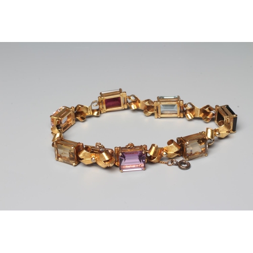 295 - A MULTI-GEM BRACELET claw set with seven square facet cut stones, comprising an amethyst, aquamarine... 