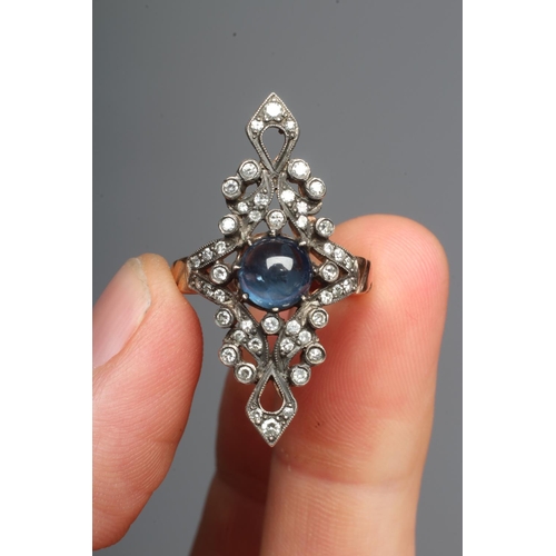296 - A GEORGIAN STYLE MARQUISE DRESS RING, the central cabochon polished circular sapphire claw set to an... 