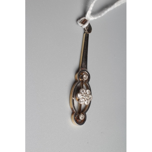 300 - AN ART DECO DIAMOND PENDANT, the flared open bar centred by a seven stone cluster with a further dia... 