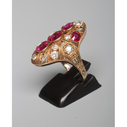 304 - A RUBY AND DIAMOND COCKTAIL RING, the domed oval panel centred by three facet cut rubies collet set ... 