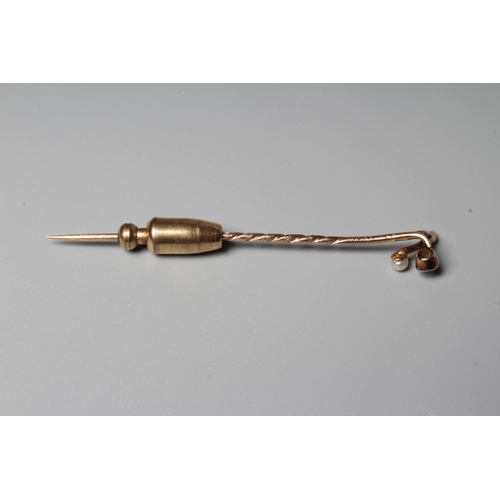 307 - A VICTORIAN DIAMOND AND PEARL STICK PIN, the brilliant cut diamond collet set with a peg set small p... 