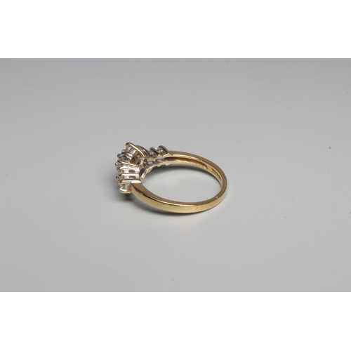 315 - A DIAMOND CLUSTER RING, the central seven stone cluster claw set to shoulders each further set with ... 