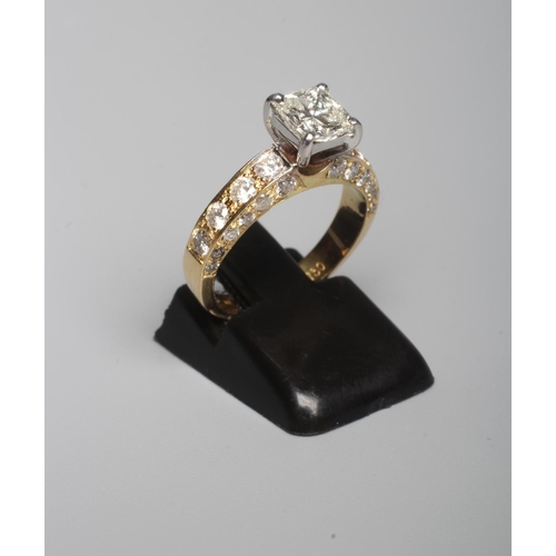 317 - A DIAMOND RING, the central Princess cut stone of approximately 1ct, claw set to shoulders each pave... 