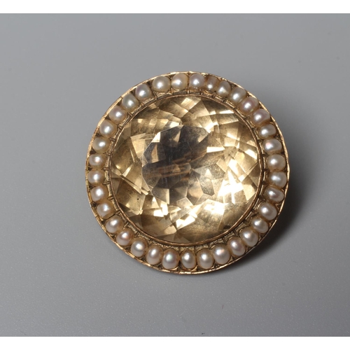 321 - A VICTORIAN CITRINE AND SEED PEARL BOSS BROOCH, the facet cut circular citrine open back collet set ... 