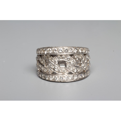 322 - A DIAMOND COCKTAIL RING, the central open rope twist graduated panel within deep borders, all pave s... 