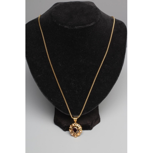 344 - AN AMETHYST AND PEARL PENDANT, possibly Indian, of open oval form, centred by a pear cut amethyst wi... 