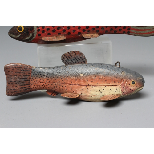 440 - TWO FOLK ART ICE FISHING LURES, comprising two carved and painted wood trout, with tin fins, metal l... 