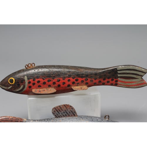 440 - TWO FOLK ART ICE FISHING LURES, comprising two carved and painted wood trout, with tin fins, metal l... 