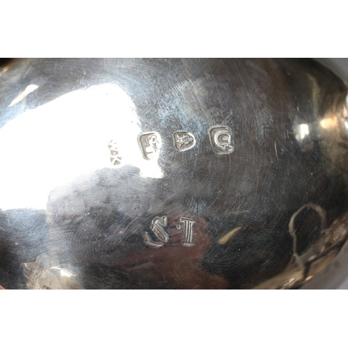 158 - AN EARLY GEORGE III SILVER SAUCEBOAT possibly by William Kersill, London 1769, the oval bowl with cr... 