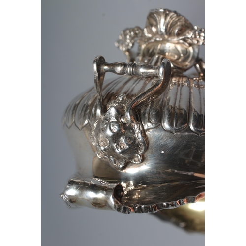 159 - AN EDWARD VII SILVER OVAL BOWL by Wm. Hutton, London 1903, the semi fluted bowl with everted scroll ... 