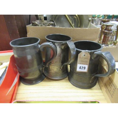 429 - THREE PEWTER TANKARDS