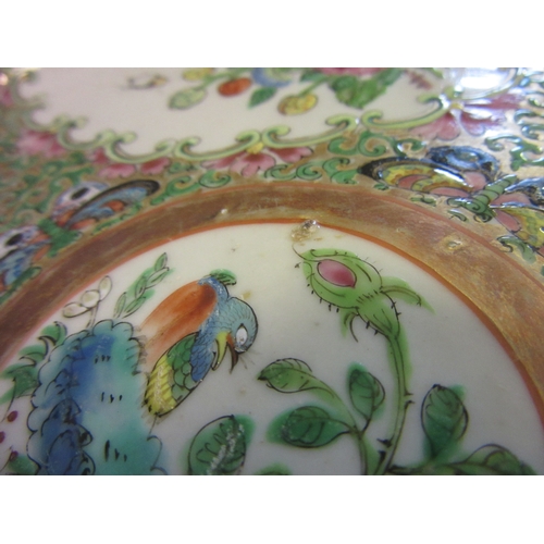 1 - A SET OF FOUR CANTONESE PORCELAIN FAMILLE ROSE PLATES painted with four panels of figures and birds ... 