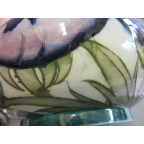 48 - A MOORCROFT ANEMONE BOWL AND COVER, mid 20th century, in typical palette on a white ground, signed i... 